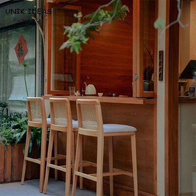 Bom preço Nordic Modern Coffee Shop Front Counter High bar Stool Garden Courtyard Creative Solid Wood Hand Made Rattan bar Chair on-line