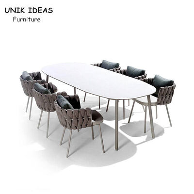 Bom preço Vime exterior do Rattan que janta cadeiras com a corda impermeável do pátio dos braços tecida 200cm on-line